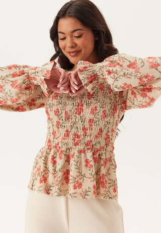 happy-holly-structure-smock-peplum-top